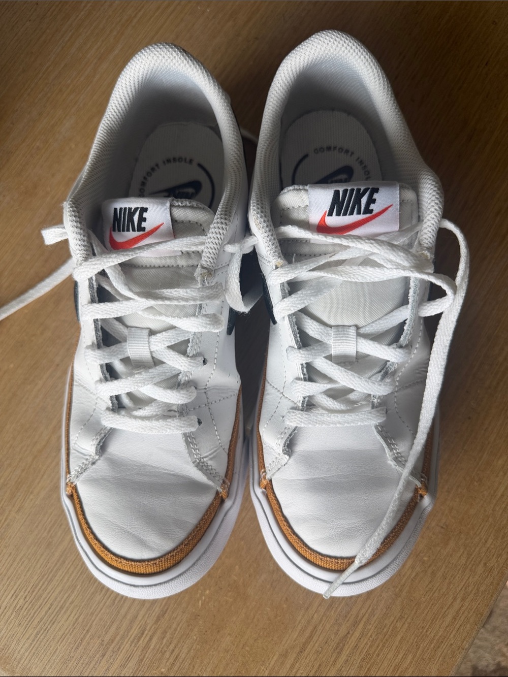 Nike White Low-Top Sneakers with Orange Accent